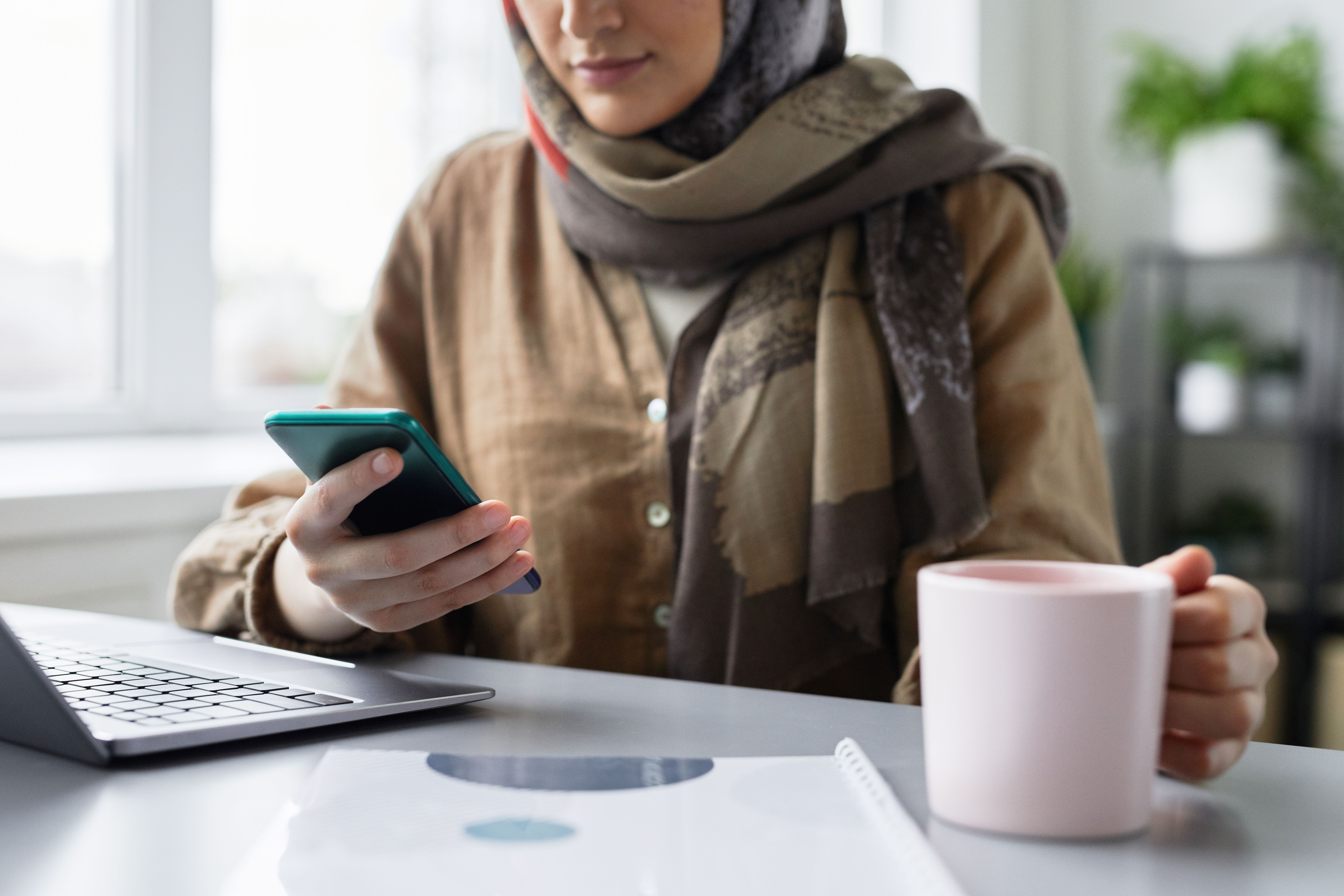 Muslim couple communicating online while exploring a serious path toward marriage with Islamic boundaries and sincere intentions.