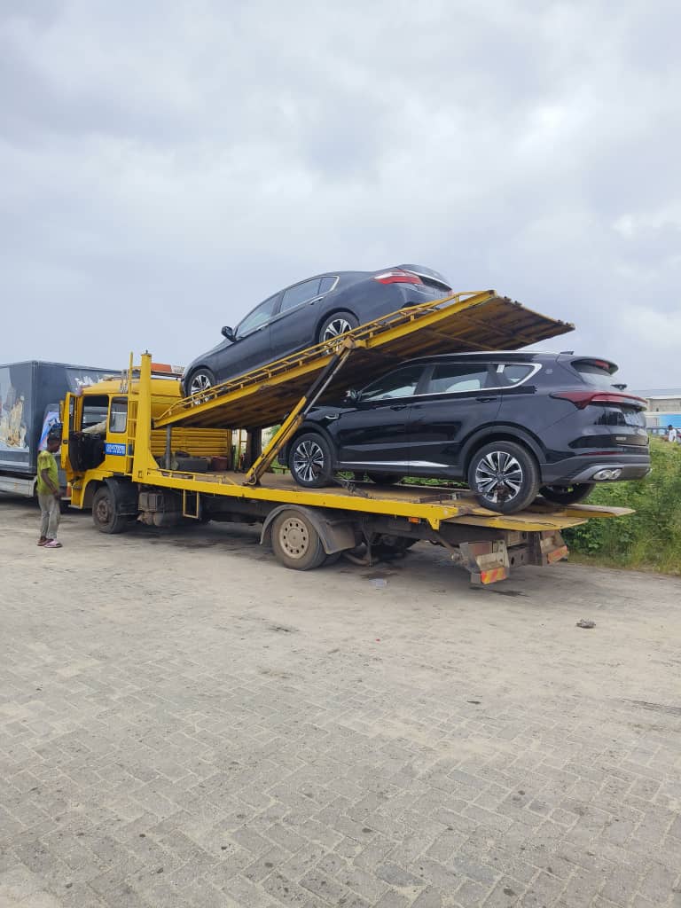 Car being loaded for transport across Nigeria