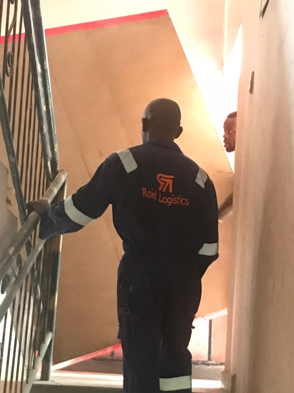 Professional movers packing boxes in Port Harcourt home