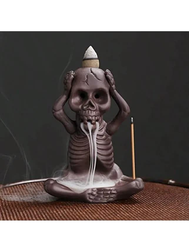 Soporte de incienso con diseño de calavera con efecto de flujo inverso