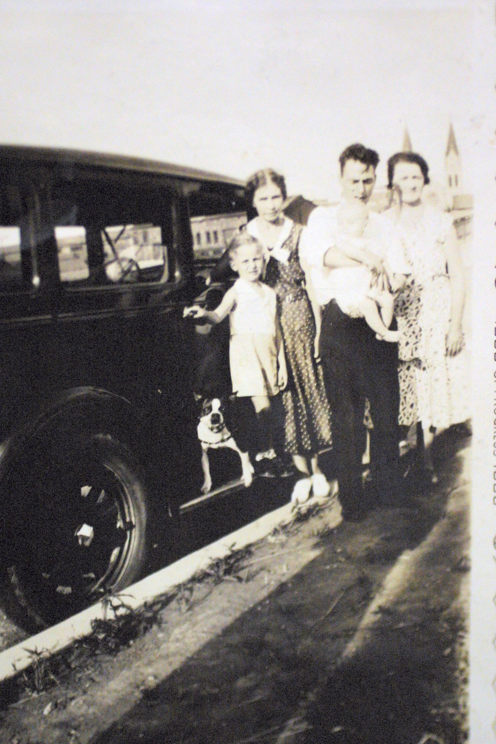 Norman E. Frapp holding
 Norman A. Frapp
 (Women Unknown)