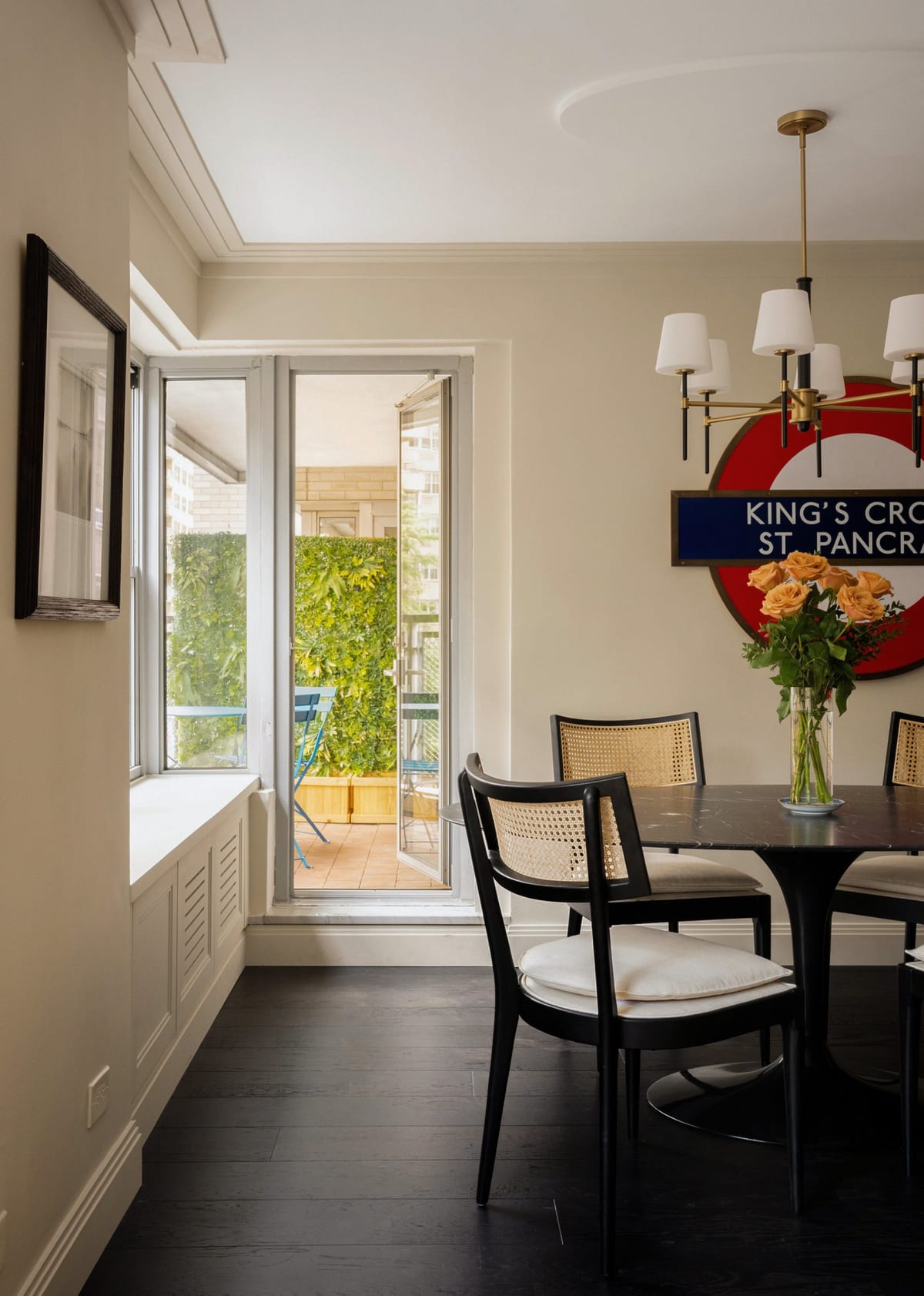 The dining area opening to the terrace