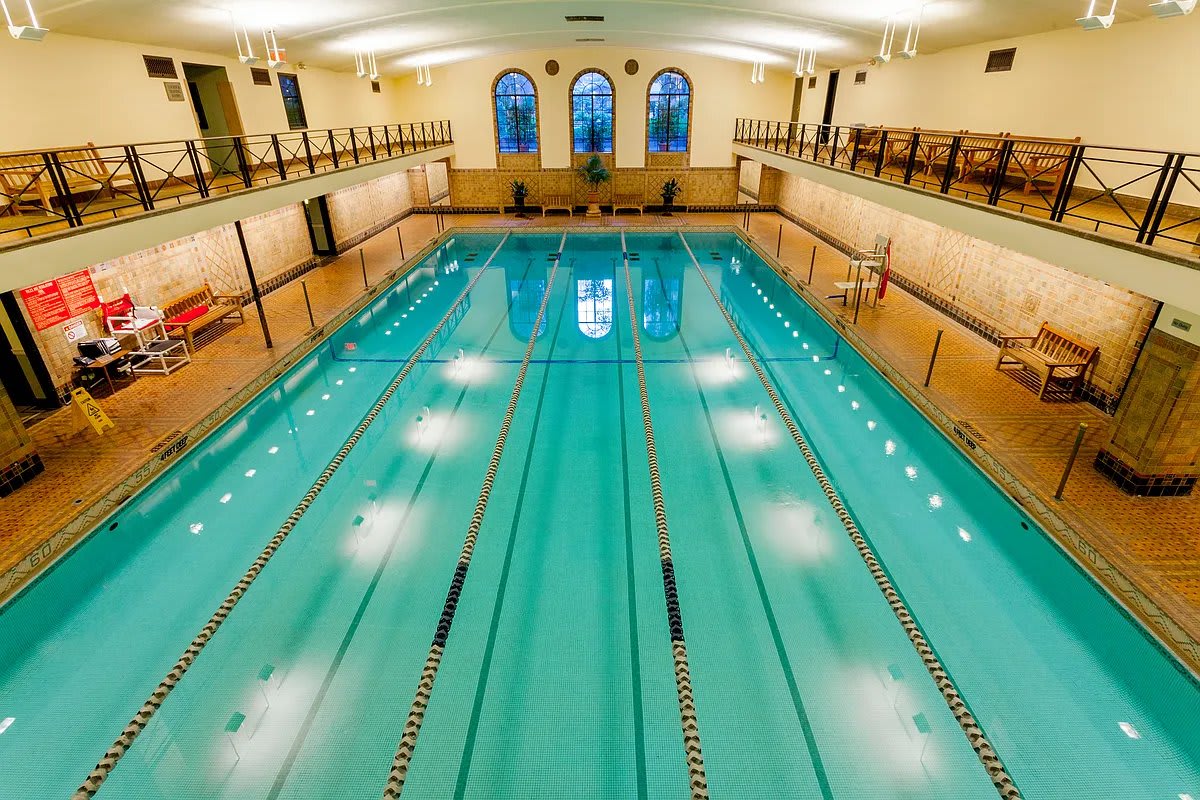 The landmark 75-foot indoor swimming pool at London Terrace, with arched windows