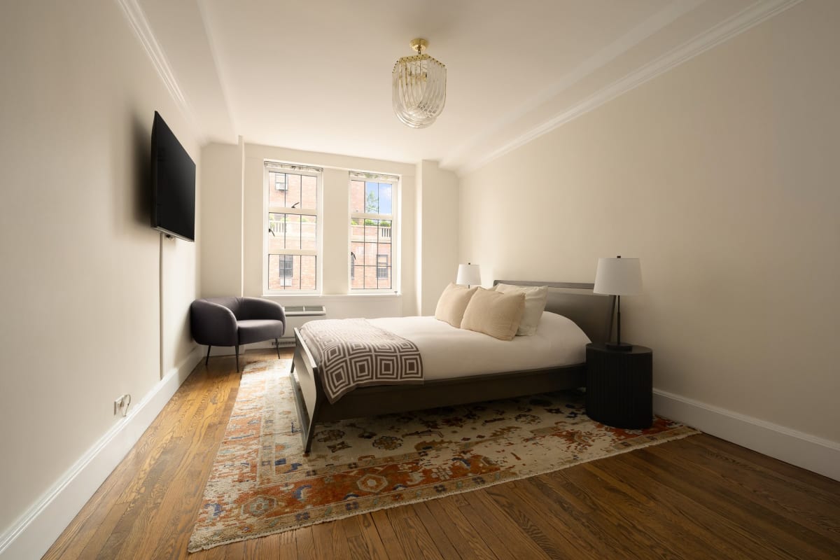 The south-facing bedroom of Residence 16J