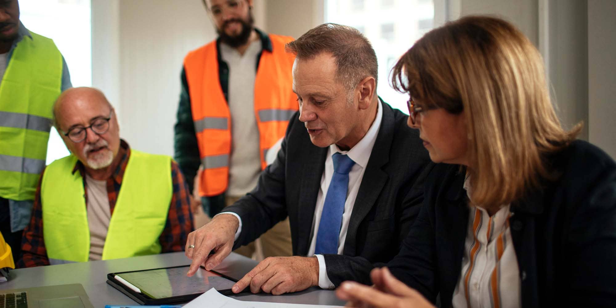 Investigation team discussing an incident and reviewing documentation