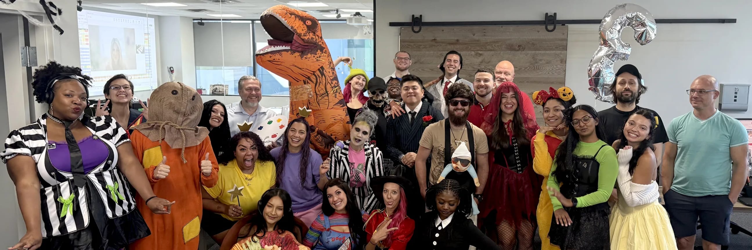 The Platinum Fundraising team in Halloween costumes at the Fort Lauderdale office