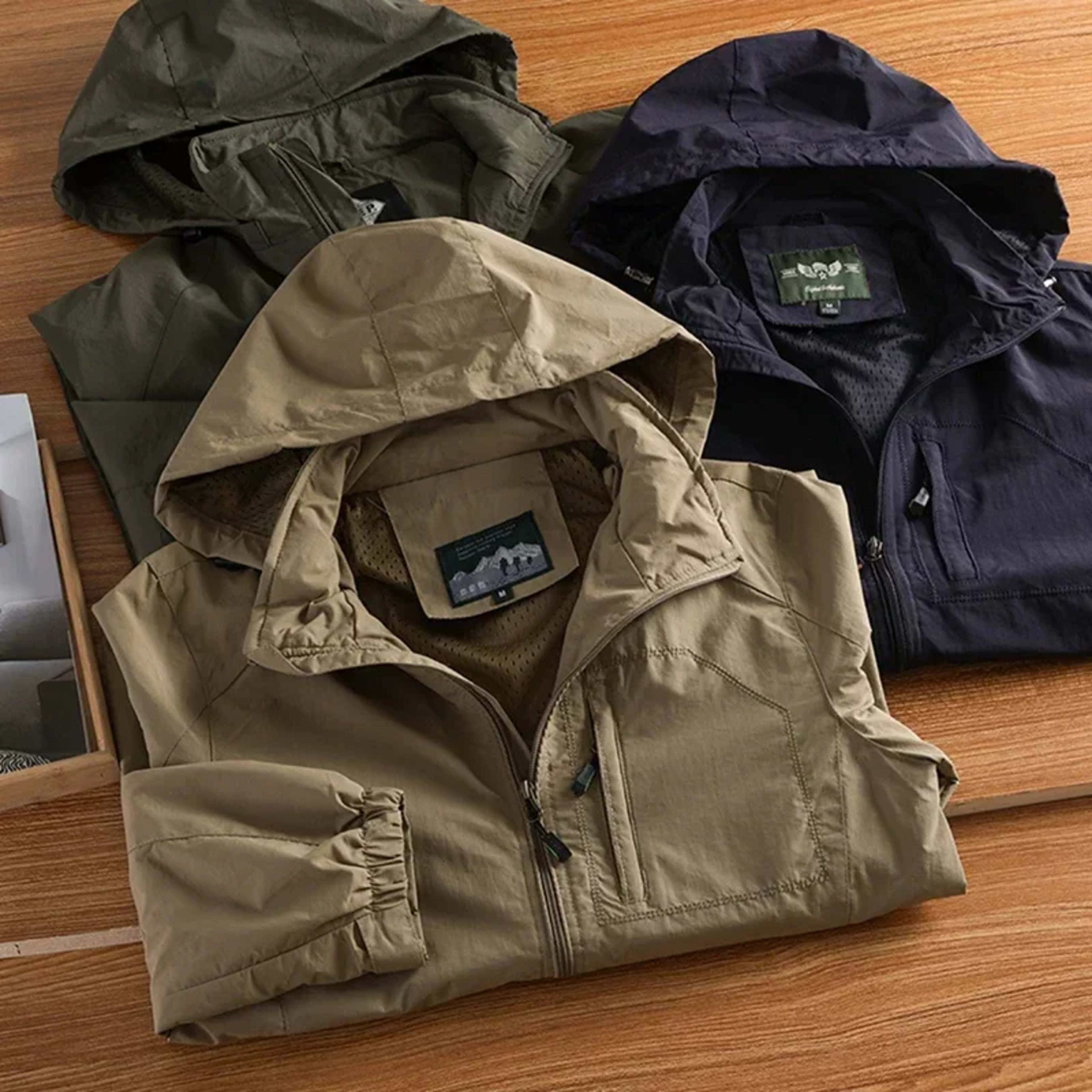 Men's Jacket Spring and Autumn Three Proof Fashion Casual Loose Hooded Professional Outdoor Windproof Windbreaker Coat 2