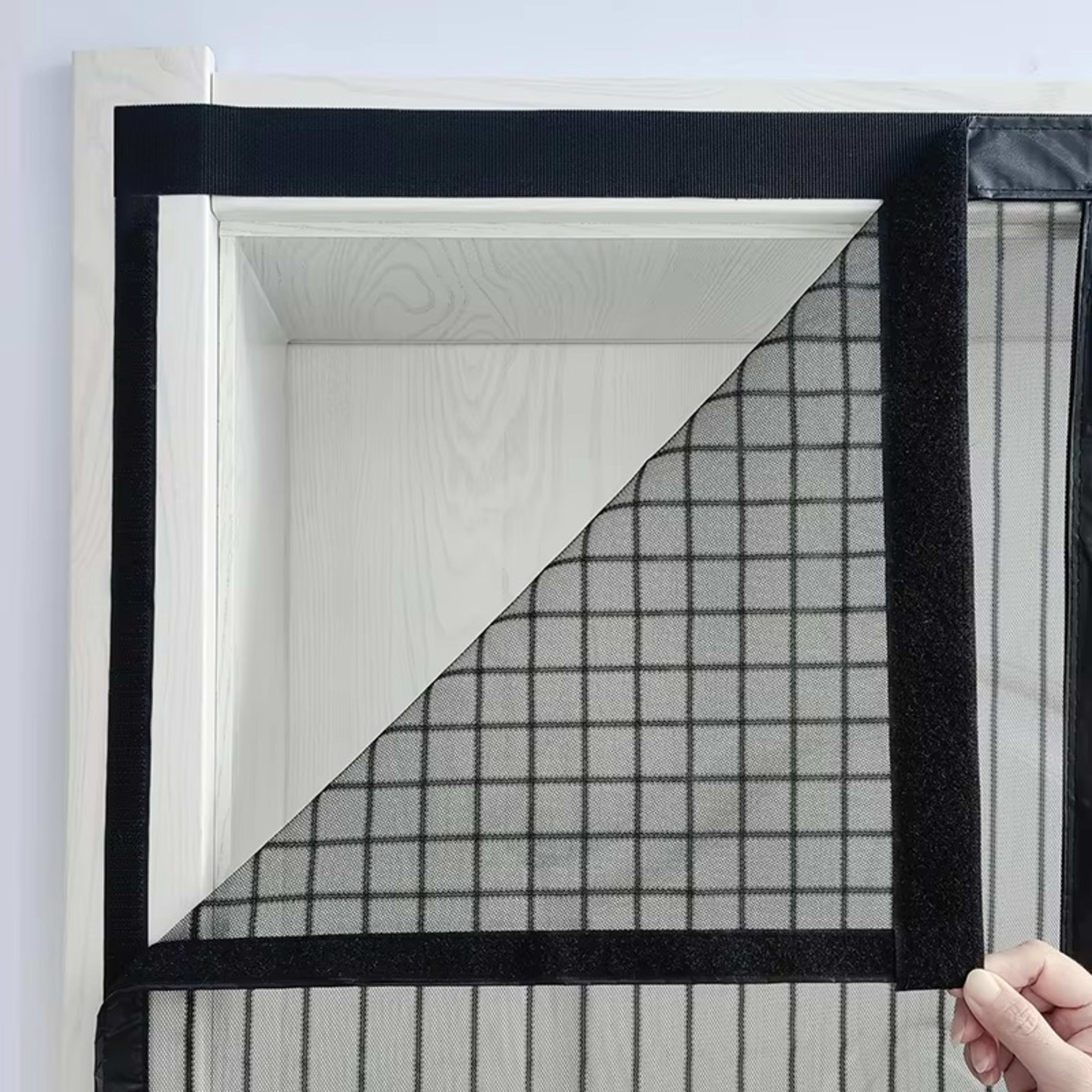A Magnetic Mosquito-proof Door Curtain Made Of Fine Mesh Material That Effectively Keeps Mosquitoes Away. It Features A  4