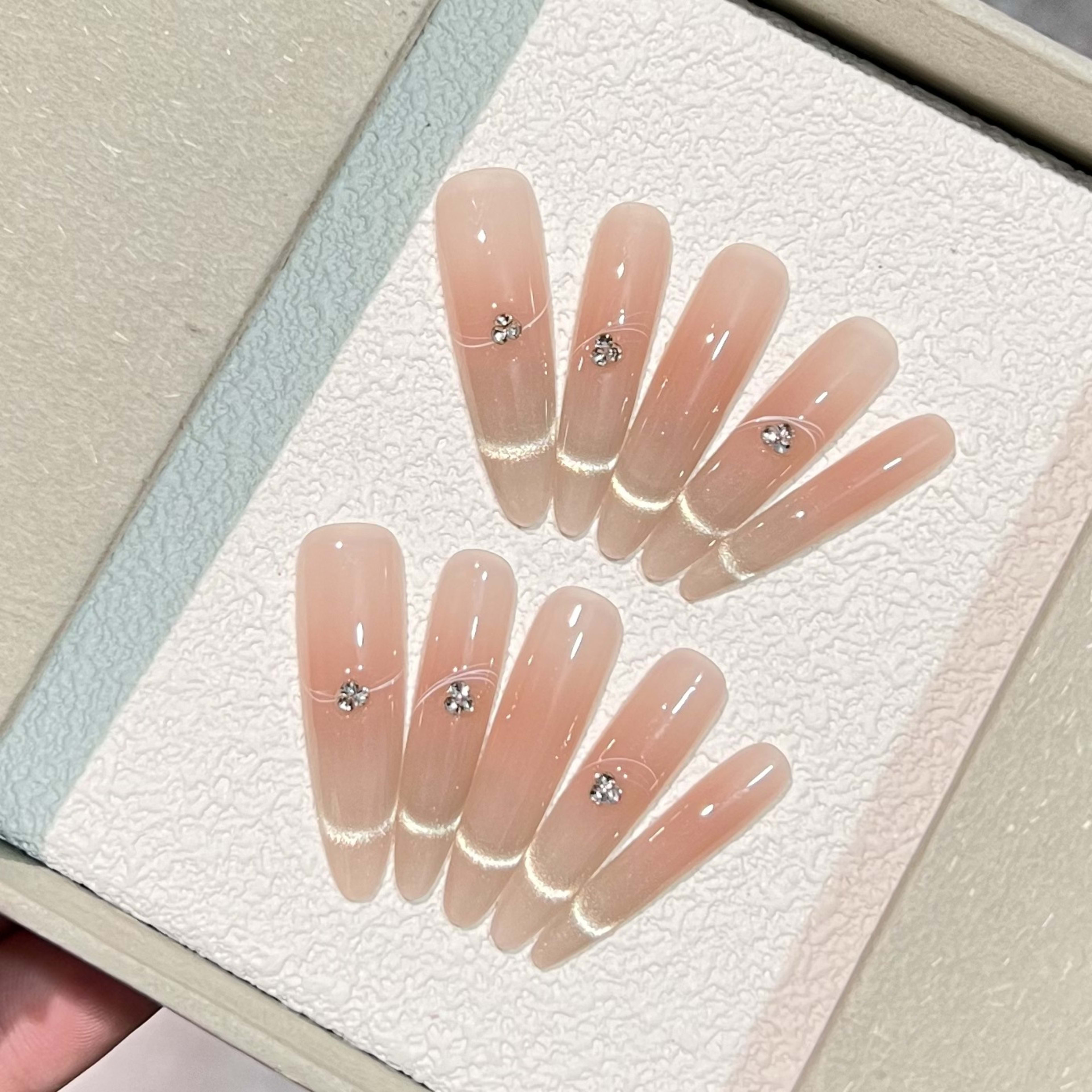 Slender Elegant Fingers Adorn A Pure 6