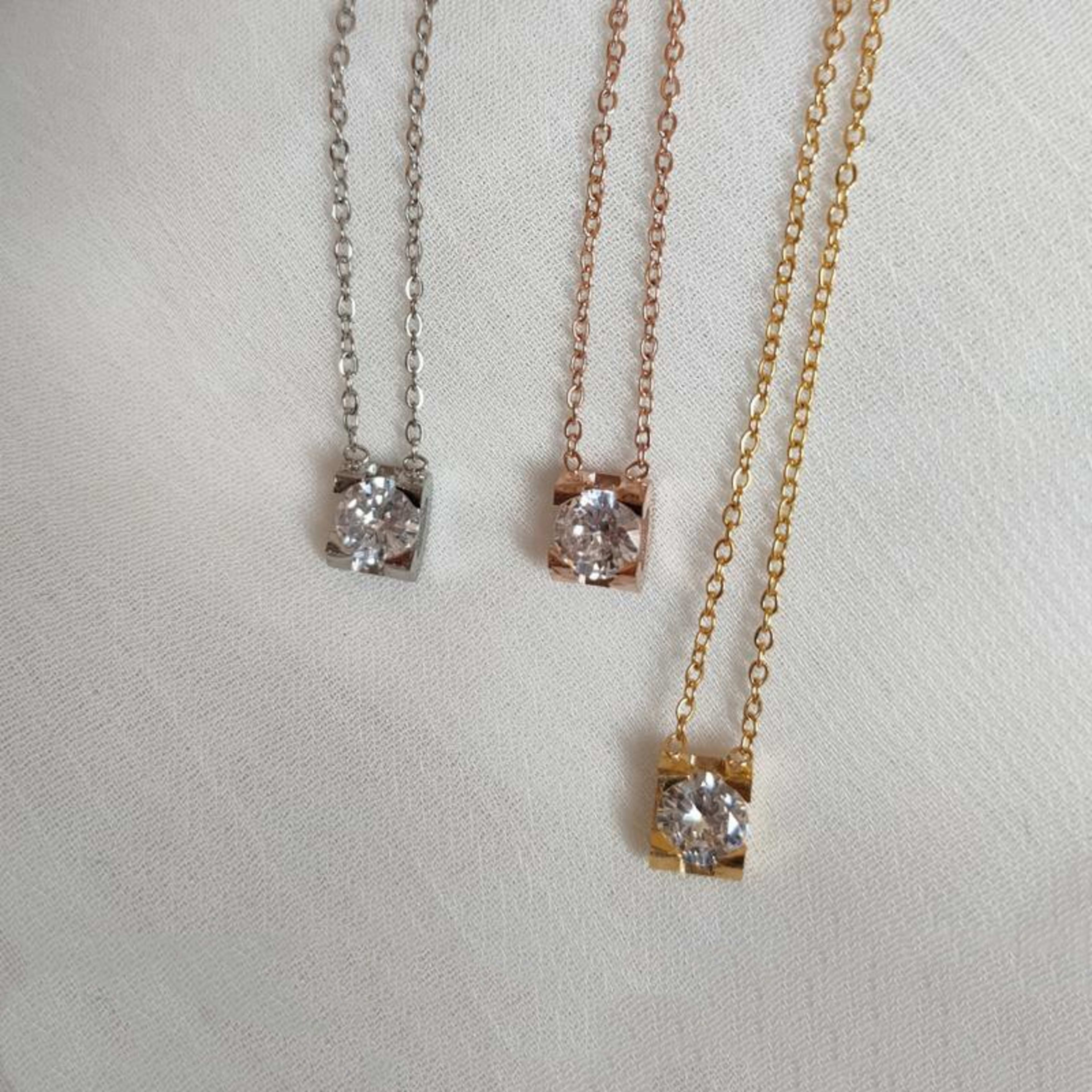 Simple Four-claw Single Diamond Pendant Female Temperament Titanium Steel Necklace 4