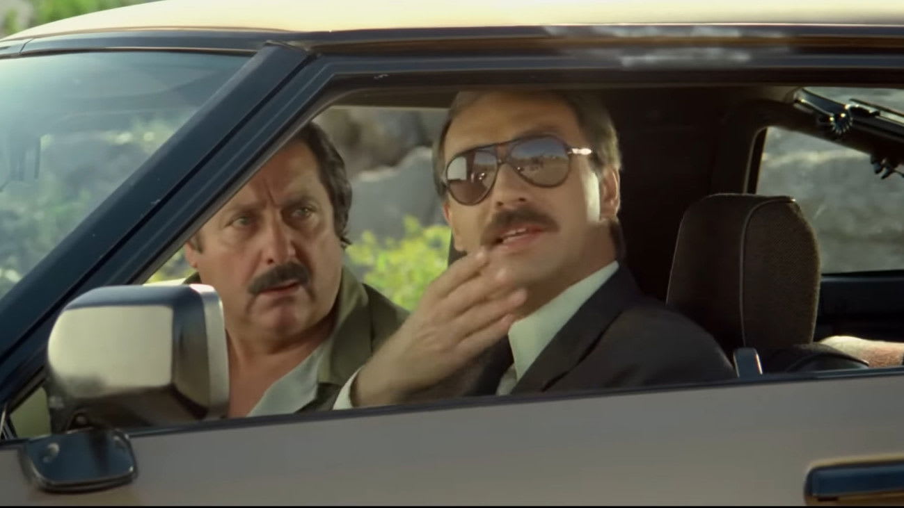 Juan Manuel Tenuta y Luis Brandoni en Esperando la carroza (1985)