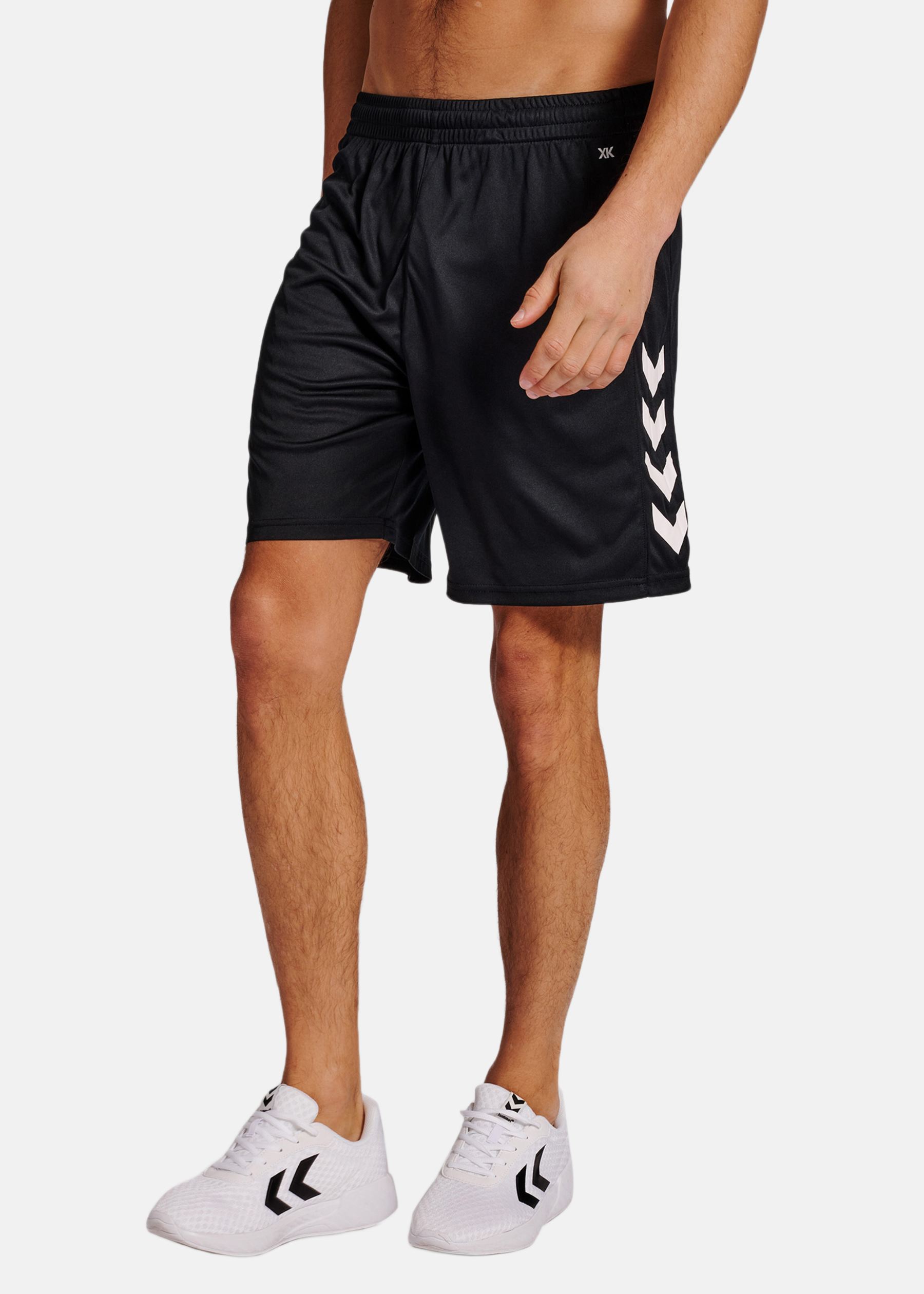 hmlCORE XK POLY SHORTS |  - sv-se - herr - klader - shorts - lopar-traningsshorts - traningsshorts | Padelspecialisterna