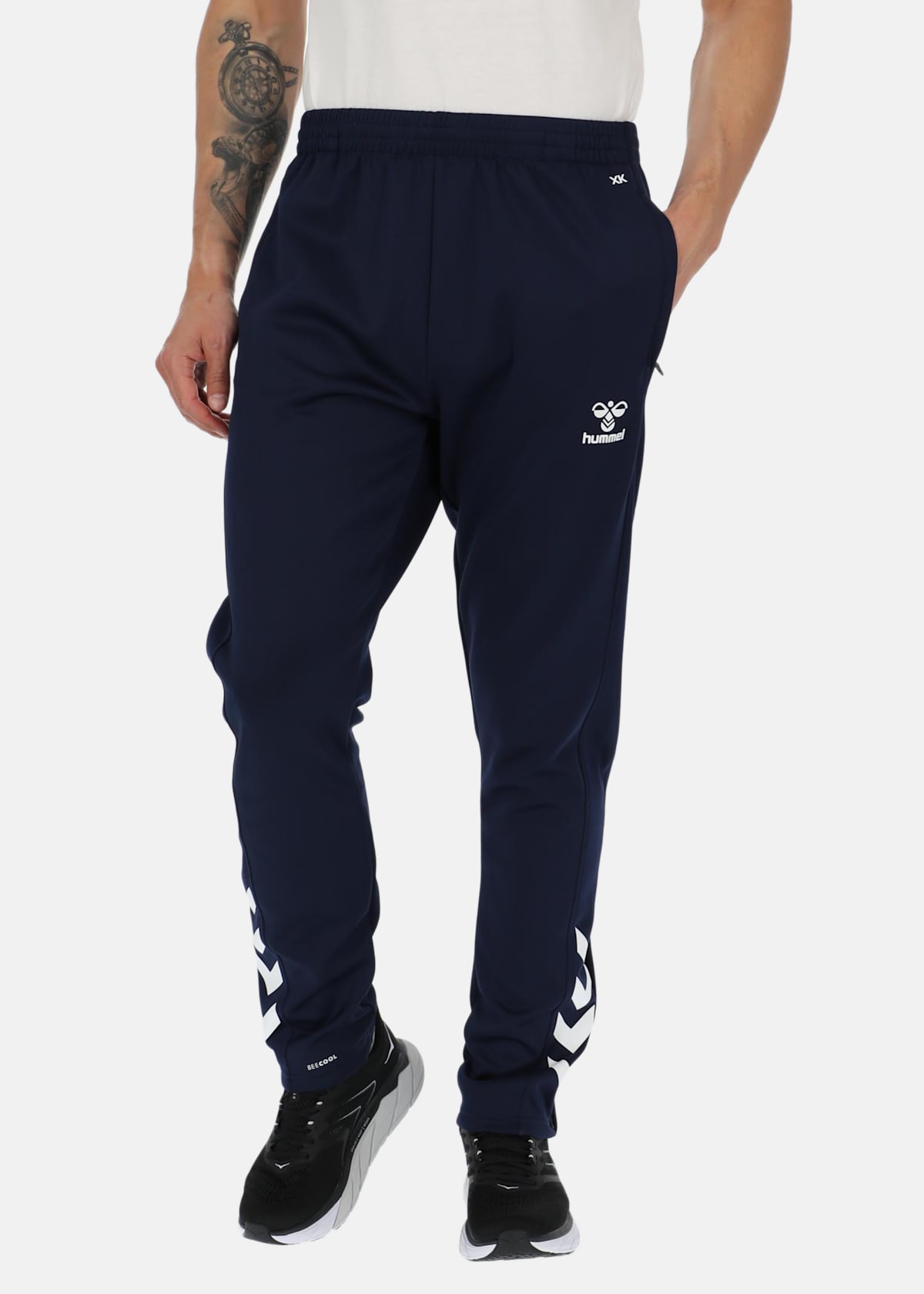 hmlCORE XK POLY PANTS |  - sv-se - dam - aktivitet - traning - traningsklader - tranings-sweat-vindbyxor | Padelspecialisterna