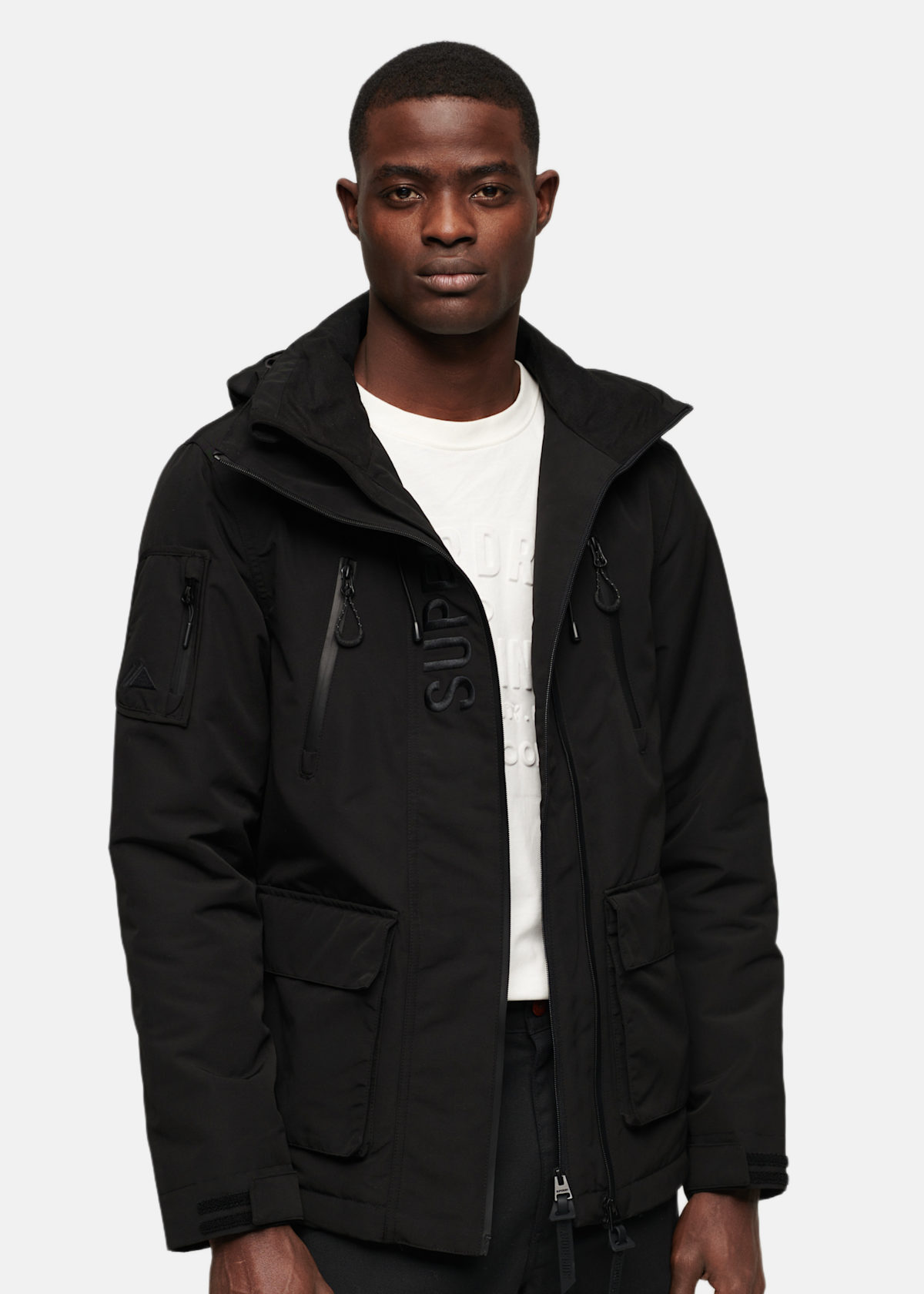 Ultimate Emb Windbreaker Jkt |  - sv-se - herr - klader - jackor - vardags-modejackor - fodrade-vardagsjackor | Padelspecialisterna