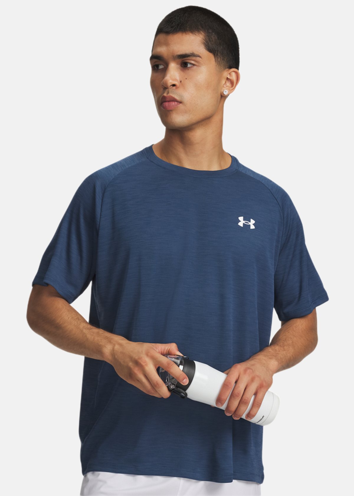 UA Tech Textured SS |  - sv-se - herr - klader - t-shirts-linnen - t-shirt-vardag-sport - kortarmad-t-shirt-vardag-sport | Padelspecialisterna