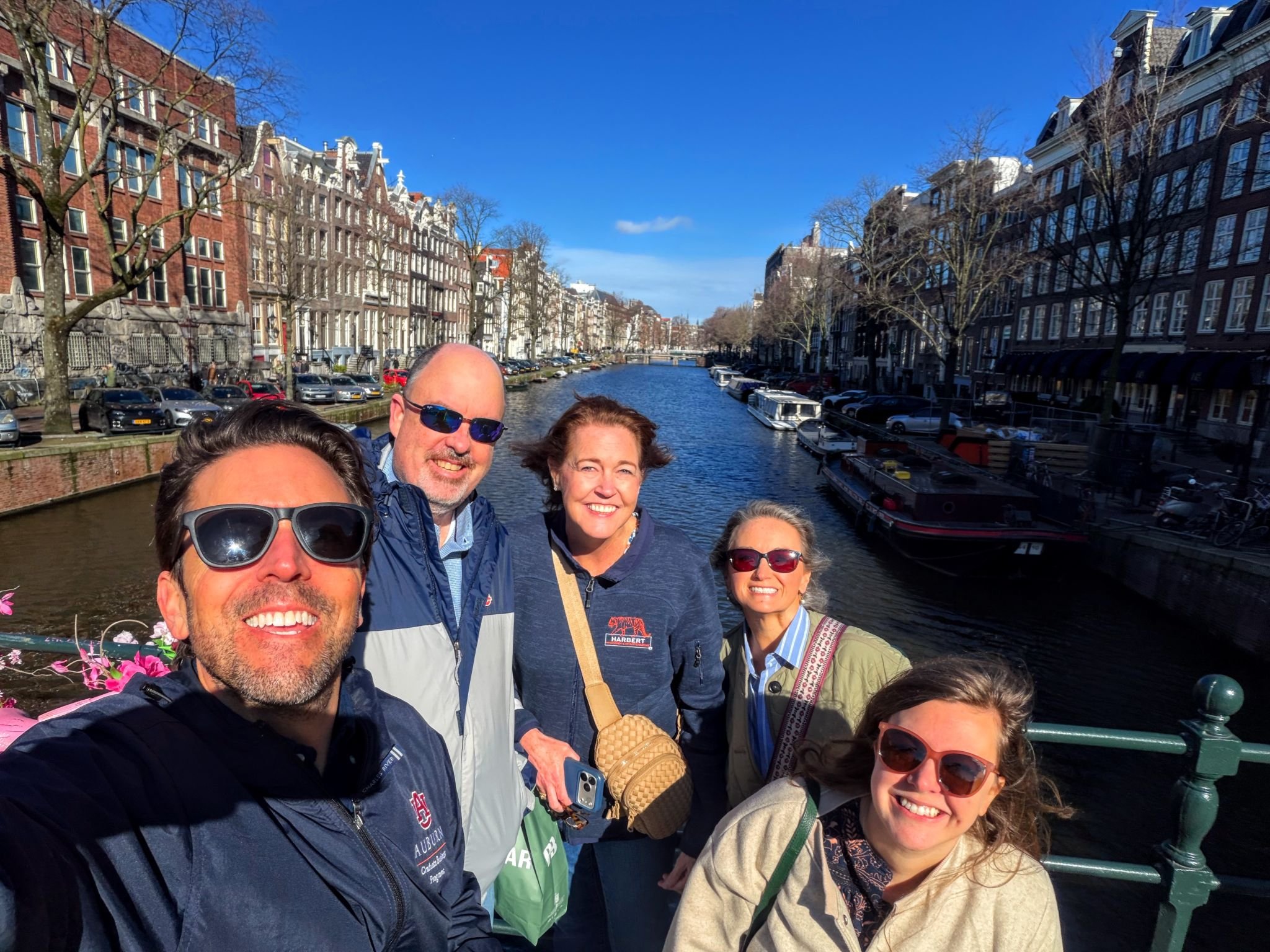 Faculty group selfie on Amsterdam canal bridge