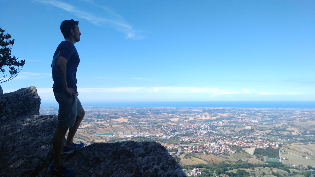 Colin overlooking a bluff in Italy