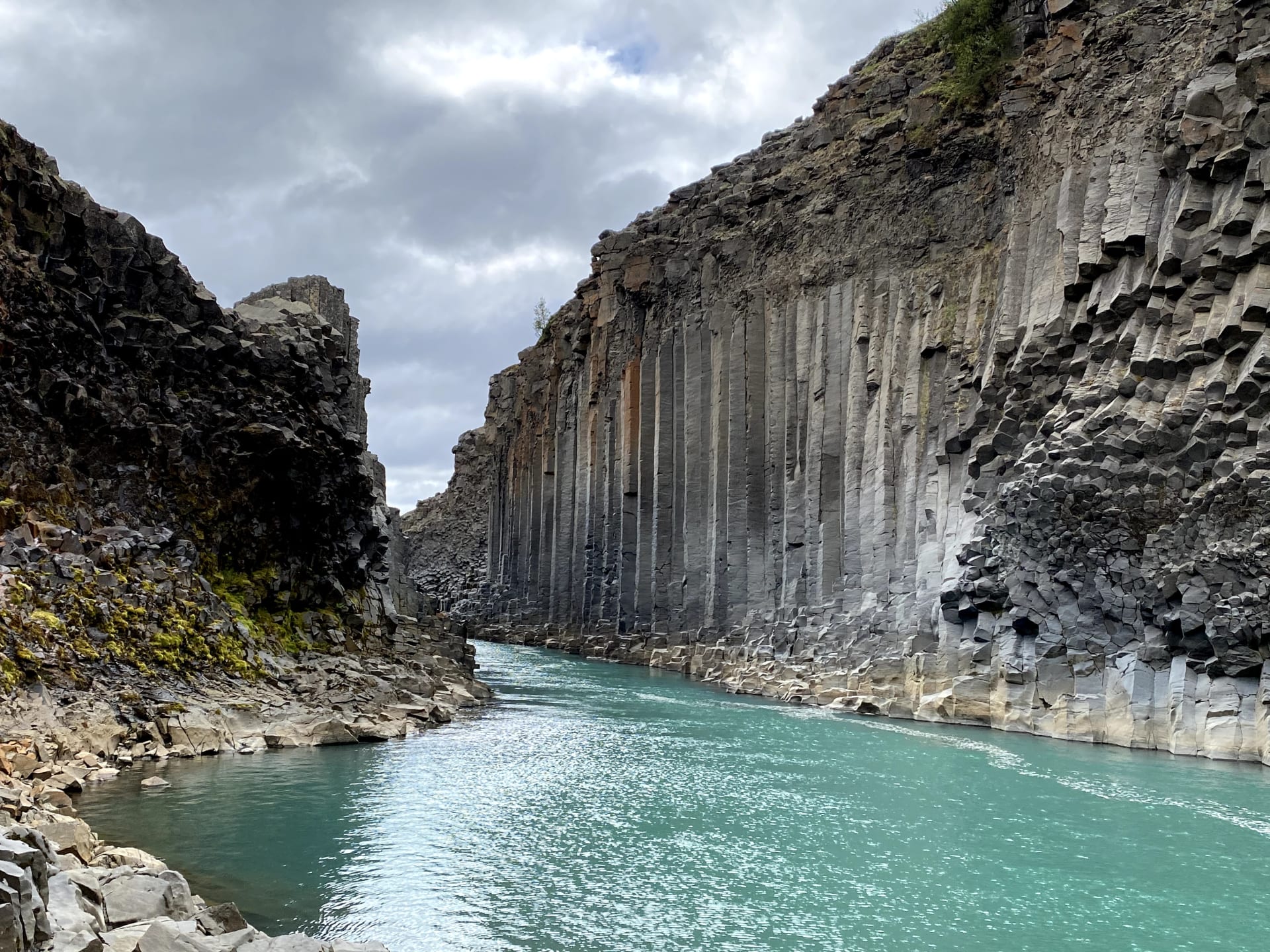 Stuðlagil Canyon with its distinctive basalt columns and turquoise water