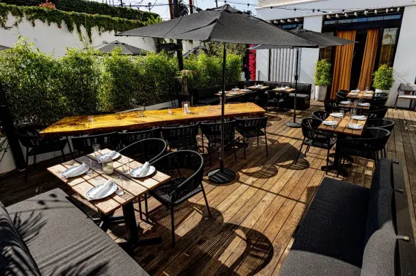 Ladyhawk Patio  at Kimpton La Peer Hotel