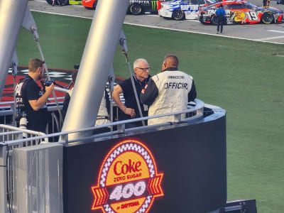 Mark Martin waving the green flag for Coke Zero 400 2026 – photo by Richard Allen