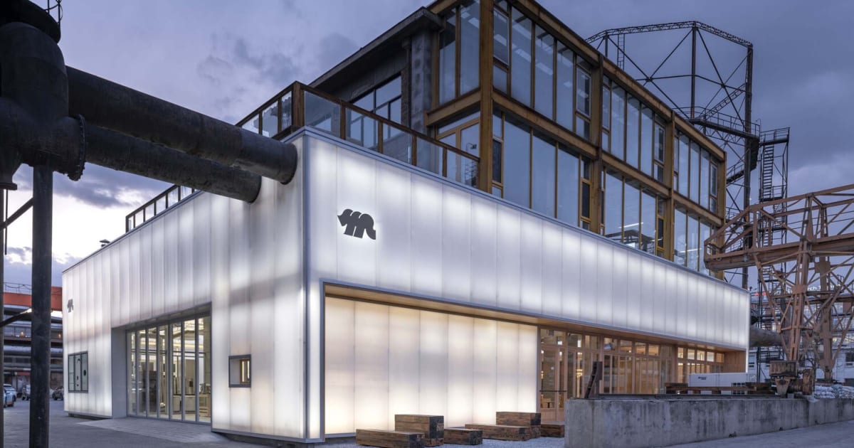 Industrial Facade with Lighting, Glass, and Concre | Feel Design