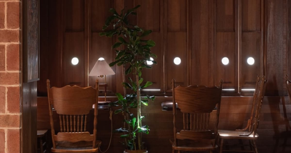 Industrial Cafe Interior with Wood, Botanicals, an | Feel Design