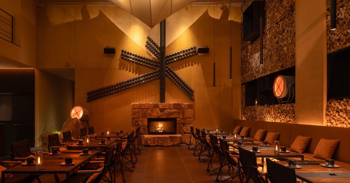 Industrial Restaurant with Metal, Wood, and Stone | Feel Design
