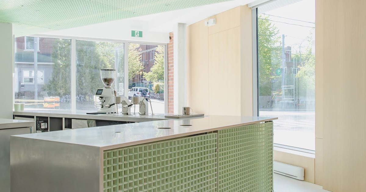 Cozy Green Kitchen with Dining Area | Feel Design