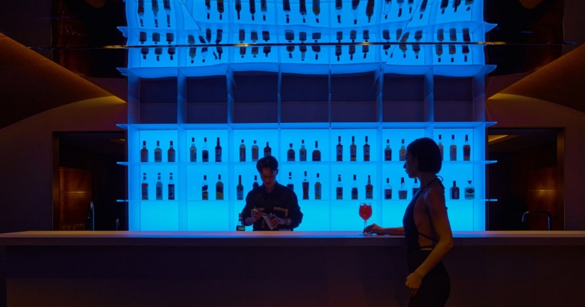 Lively Bar Scene with Wooden Counter | Feel Design