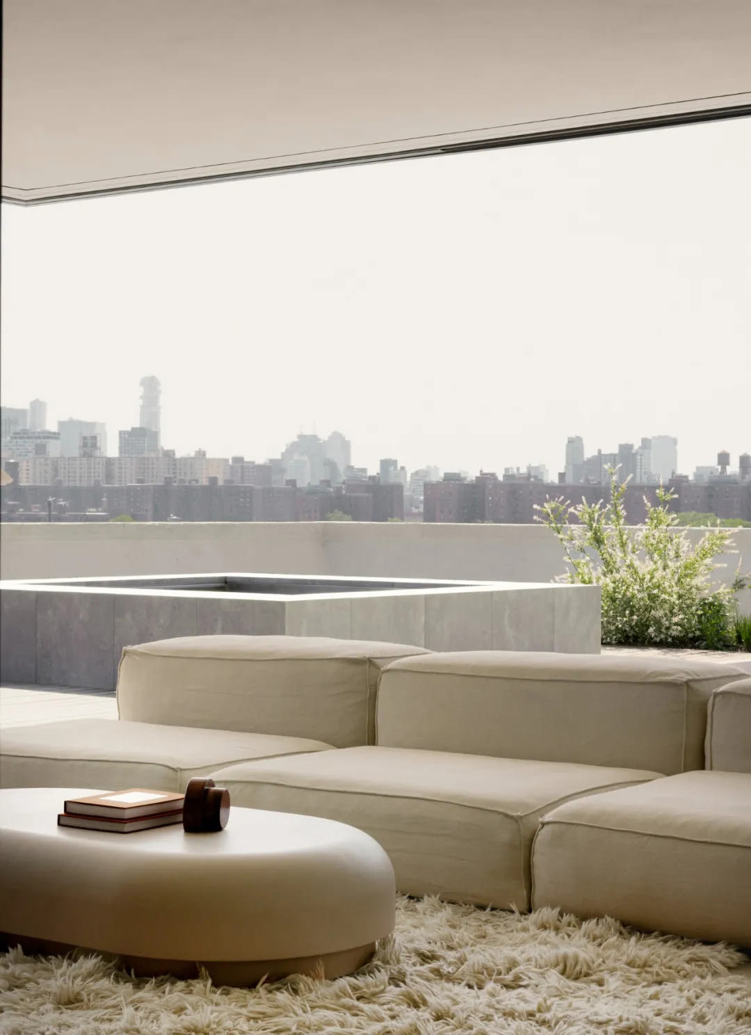 Enclosed terrace with modern furniture and outdoor living space