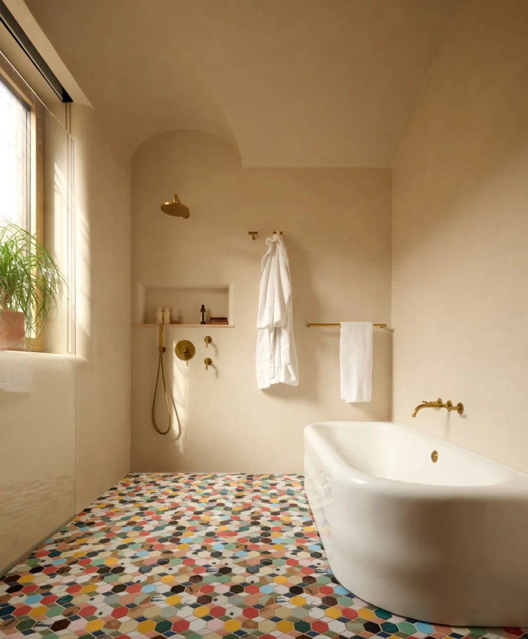 Contemporary bathroom renovation with patterned tile flooring