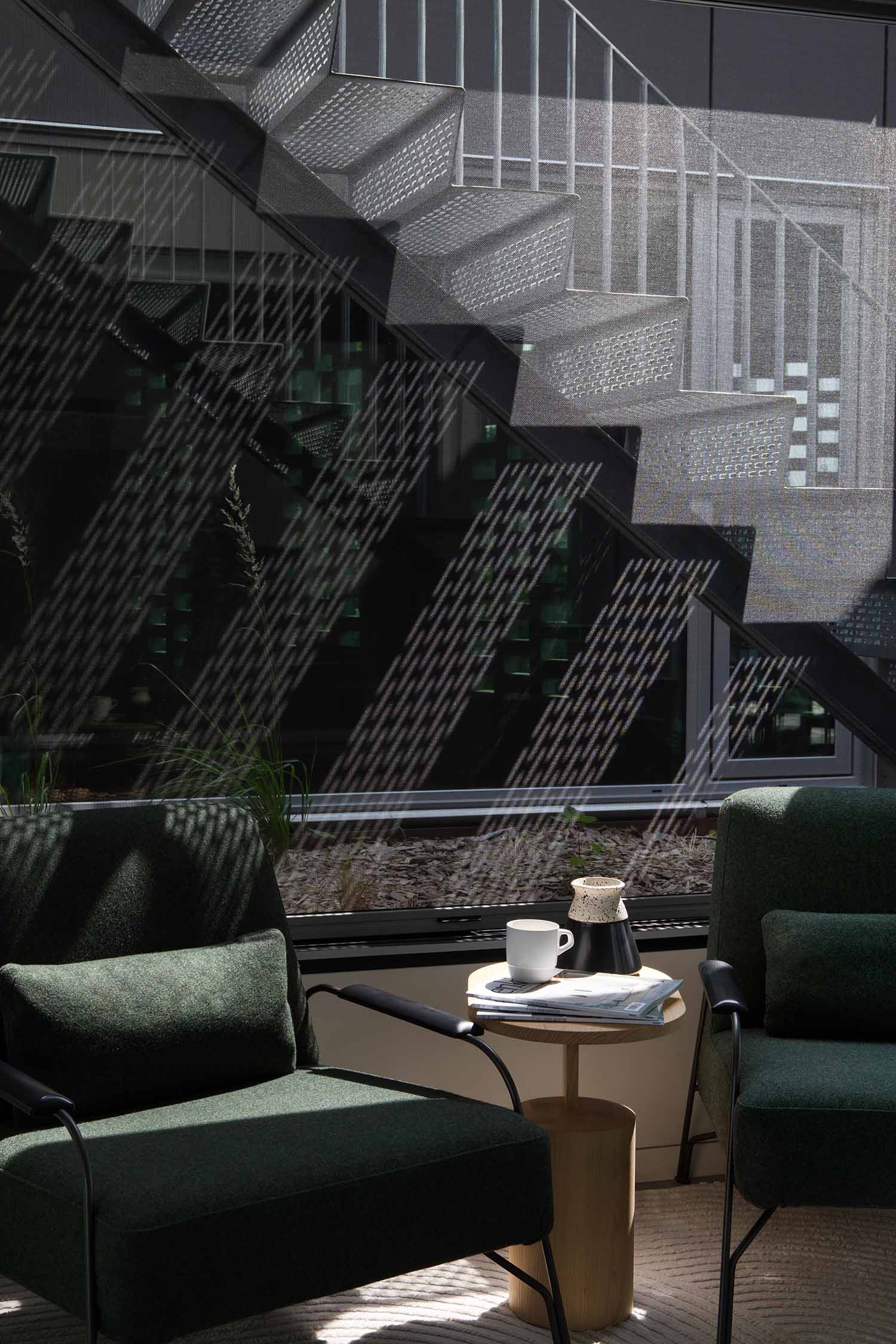 Elegant luxury living room with geometric patterns dark green velvet sophisticated design