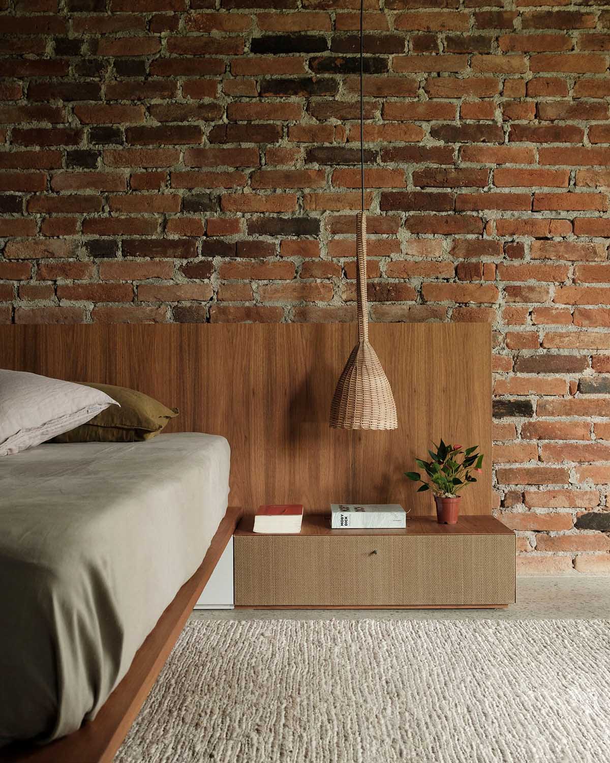 Peaceful bedroom with earth tones and wooden elements for good feng shui