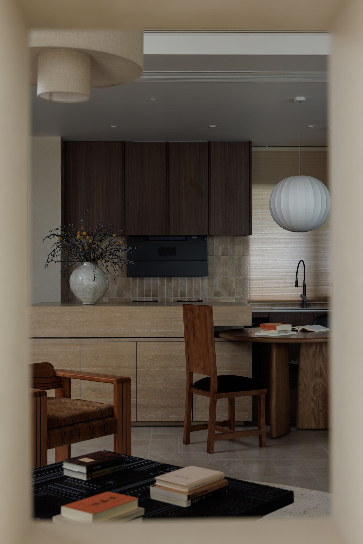 Craftsman style living room with warm wood paneling and modern furniture