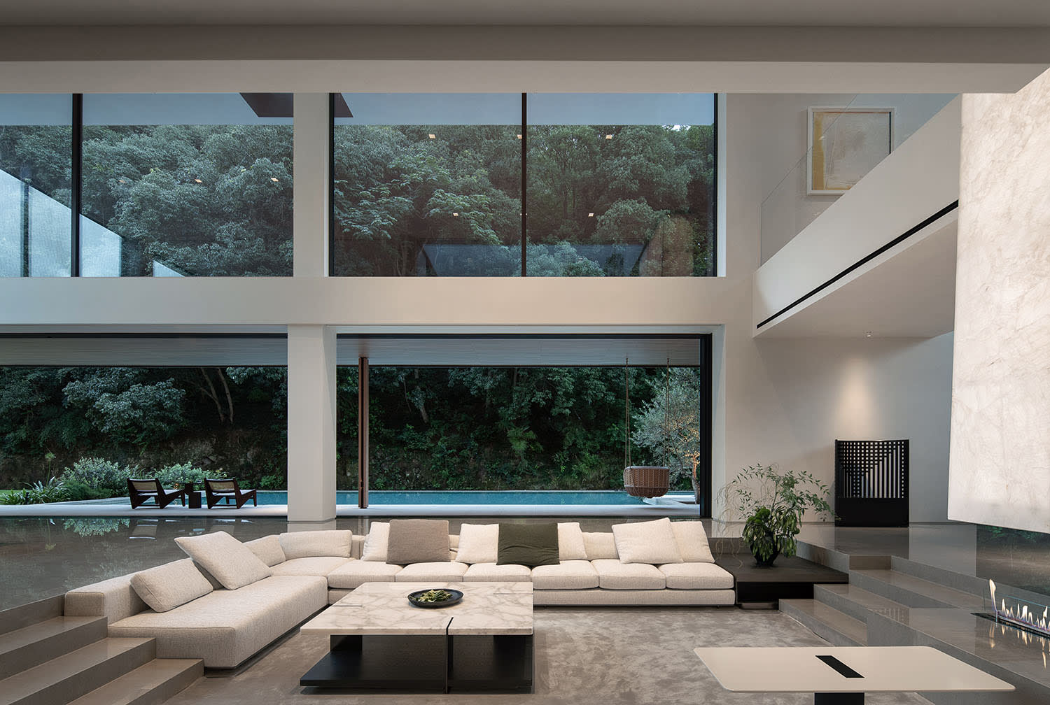 Modern living room with large windows and natural light