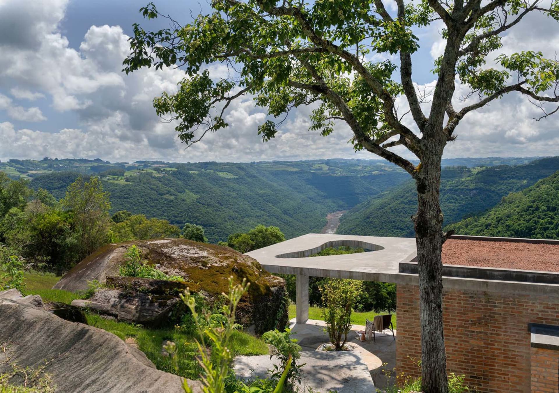 Landscape garden with stone pathway and modern concrete structures