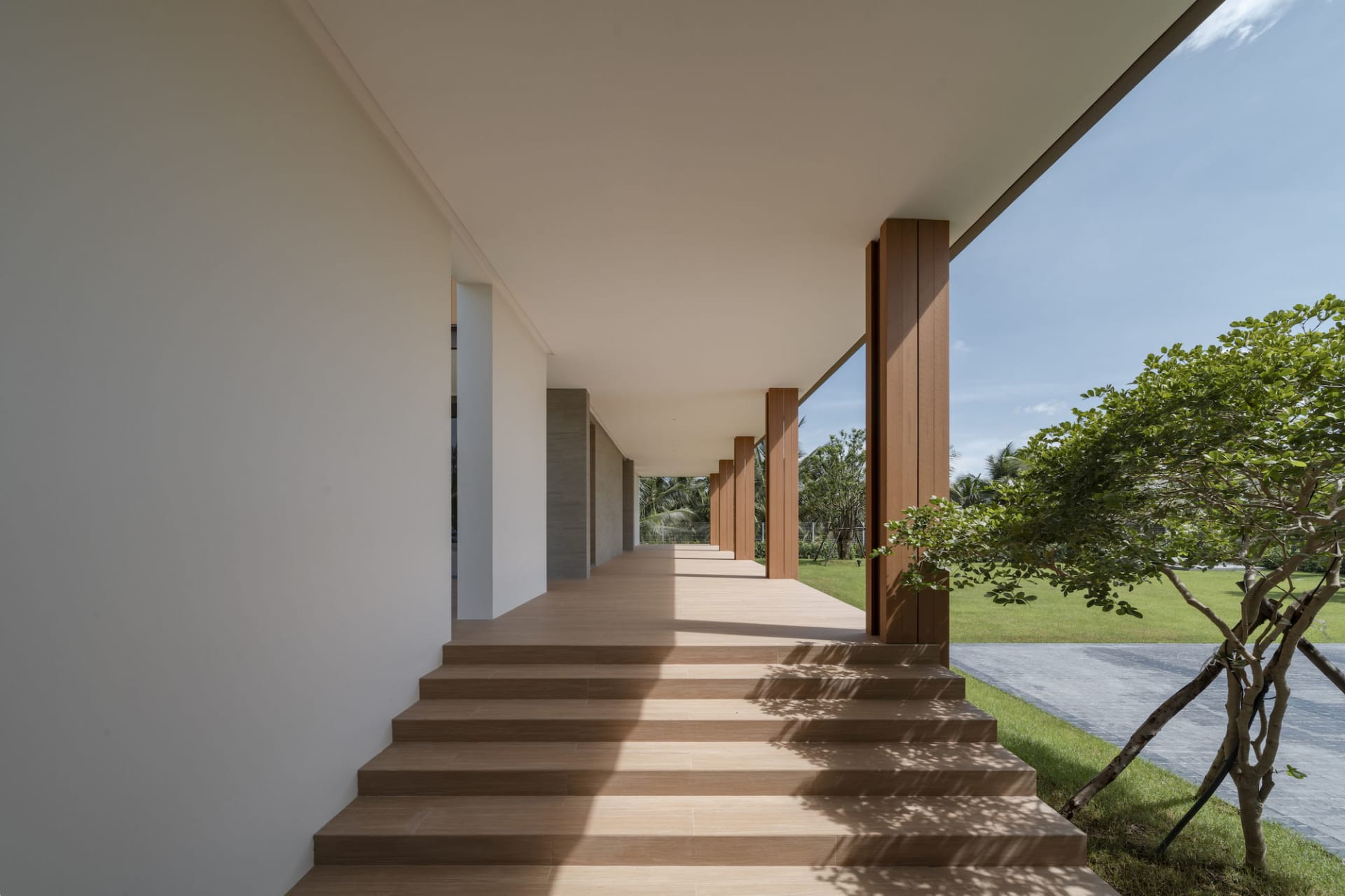 Modern exterior walkway made of concrete.