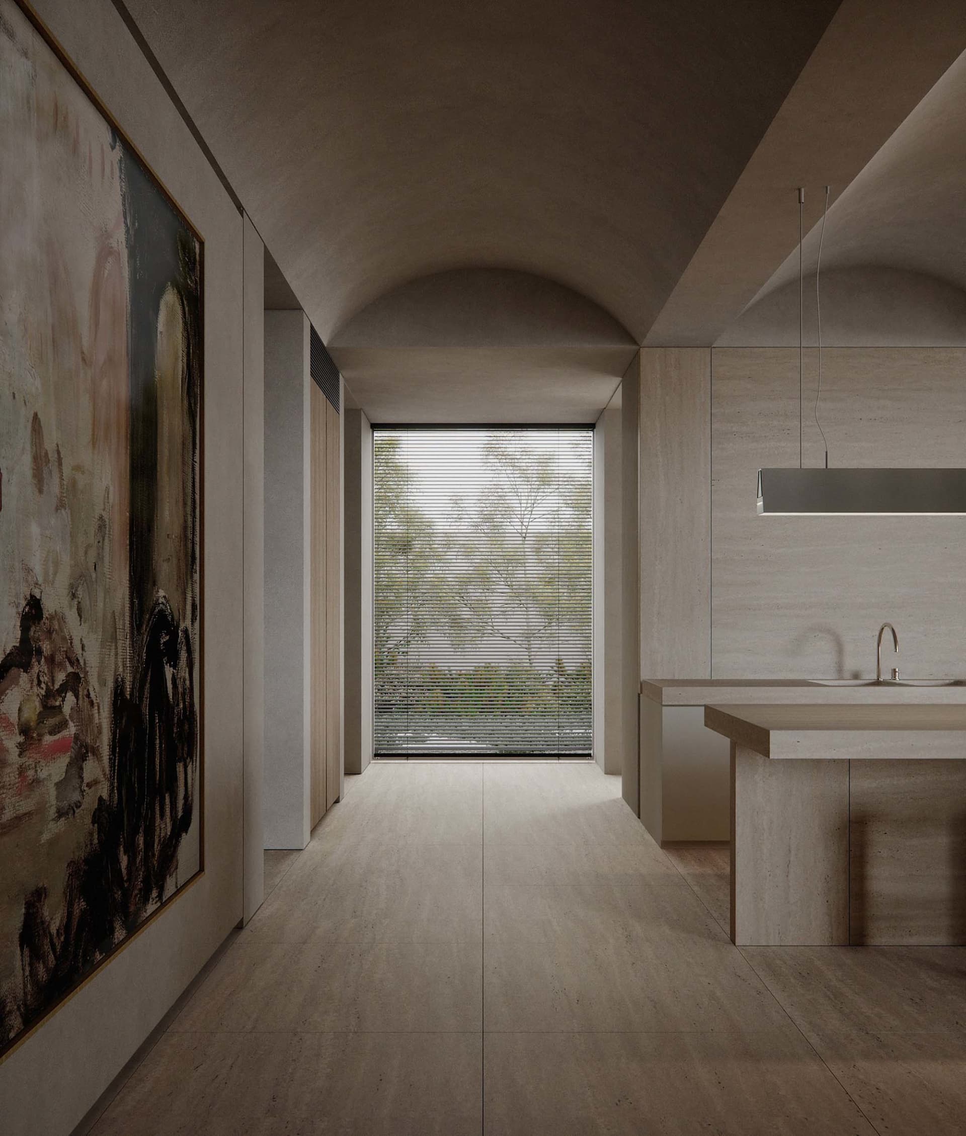 Modern minimalist kitchen with metallic accents and concrete flooring.