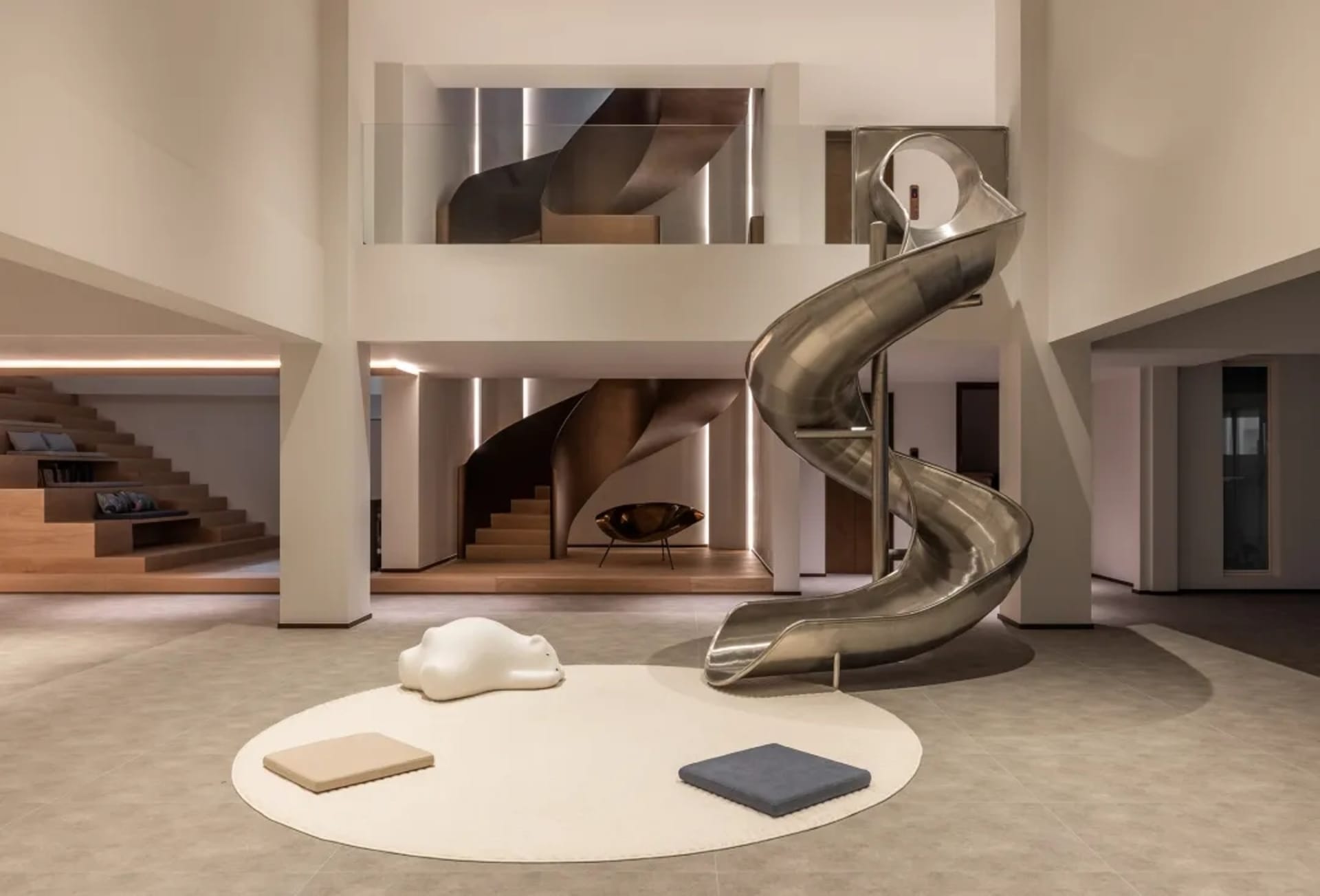 A modern playroom featuring a metal slide