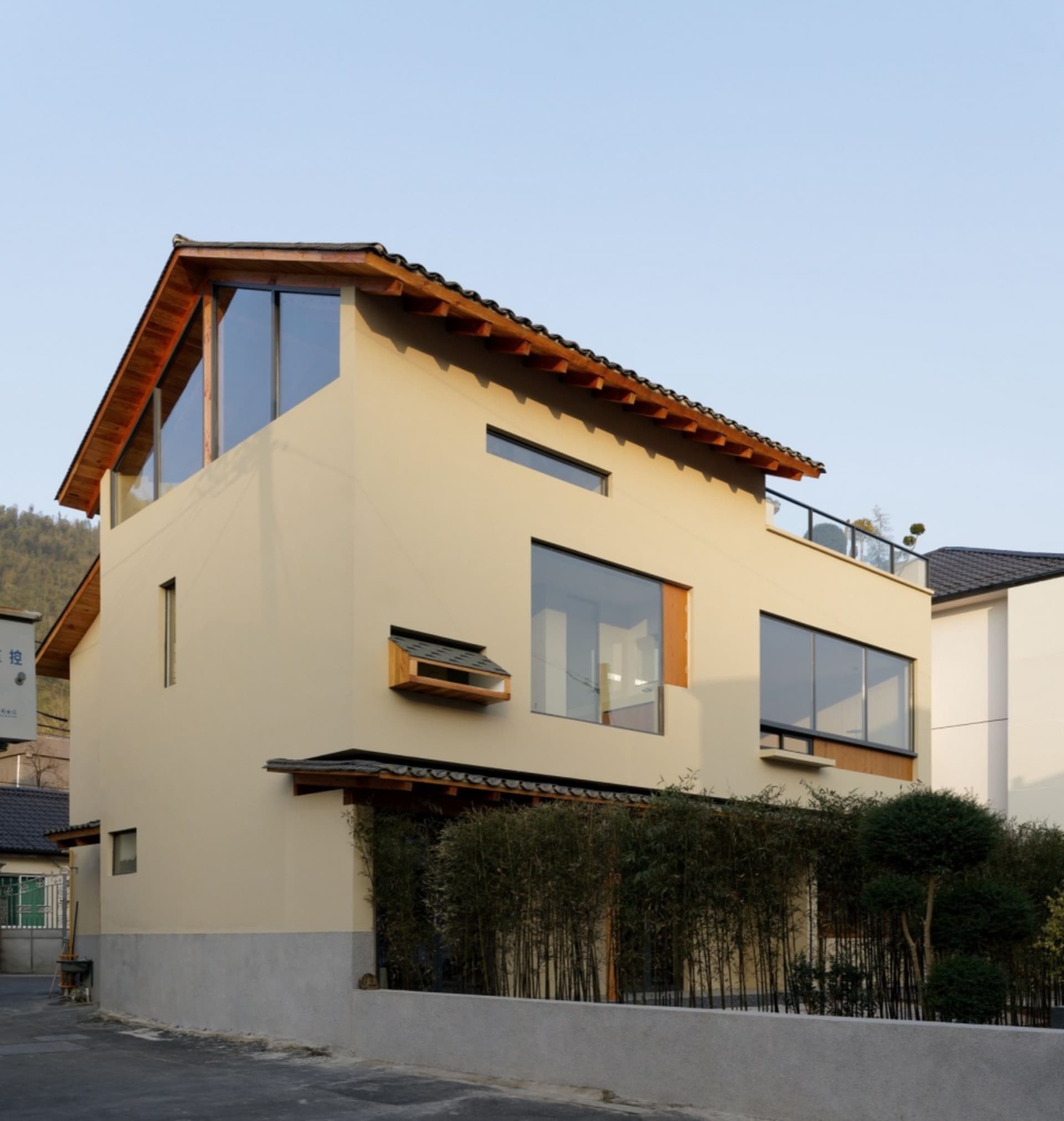 Modern residential house with concrete and glass exterior materials