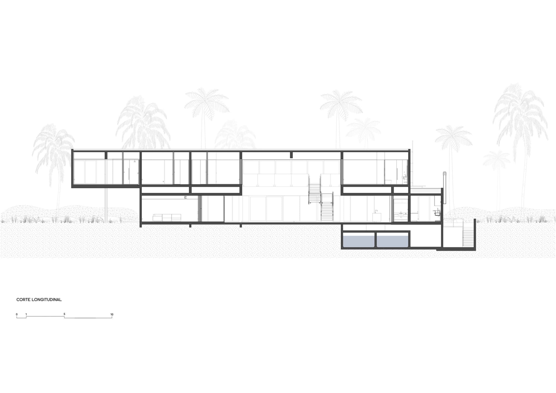 Modern residential floor plan featuring glass walls and open spaces.