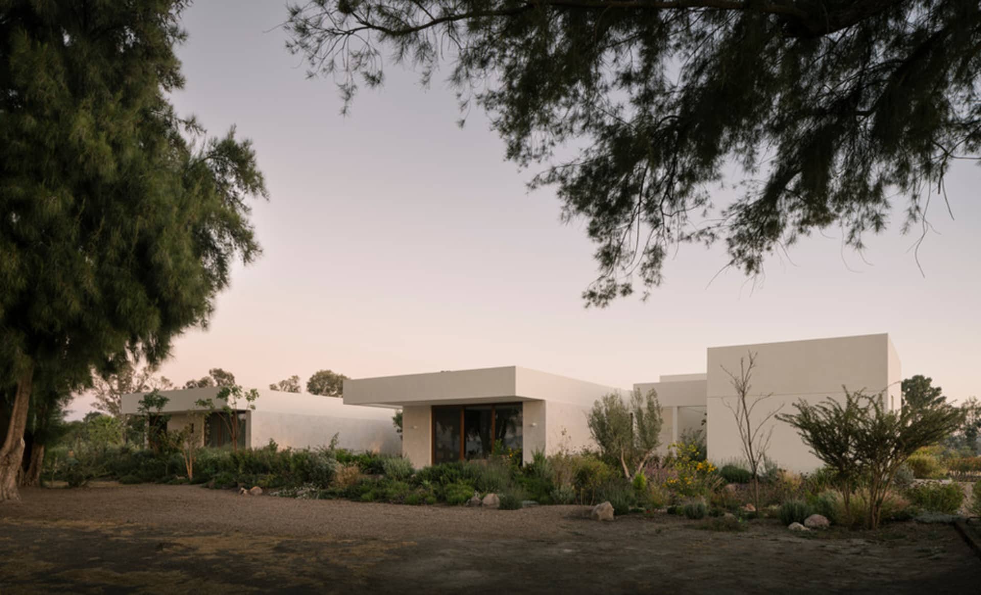 Modern residential exterior with concrete and steel elements