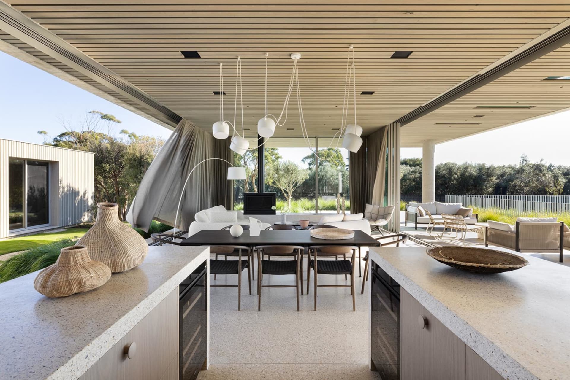 Modern residential space with concrete flooring and minimalist design.