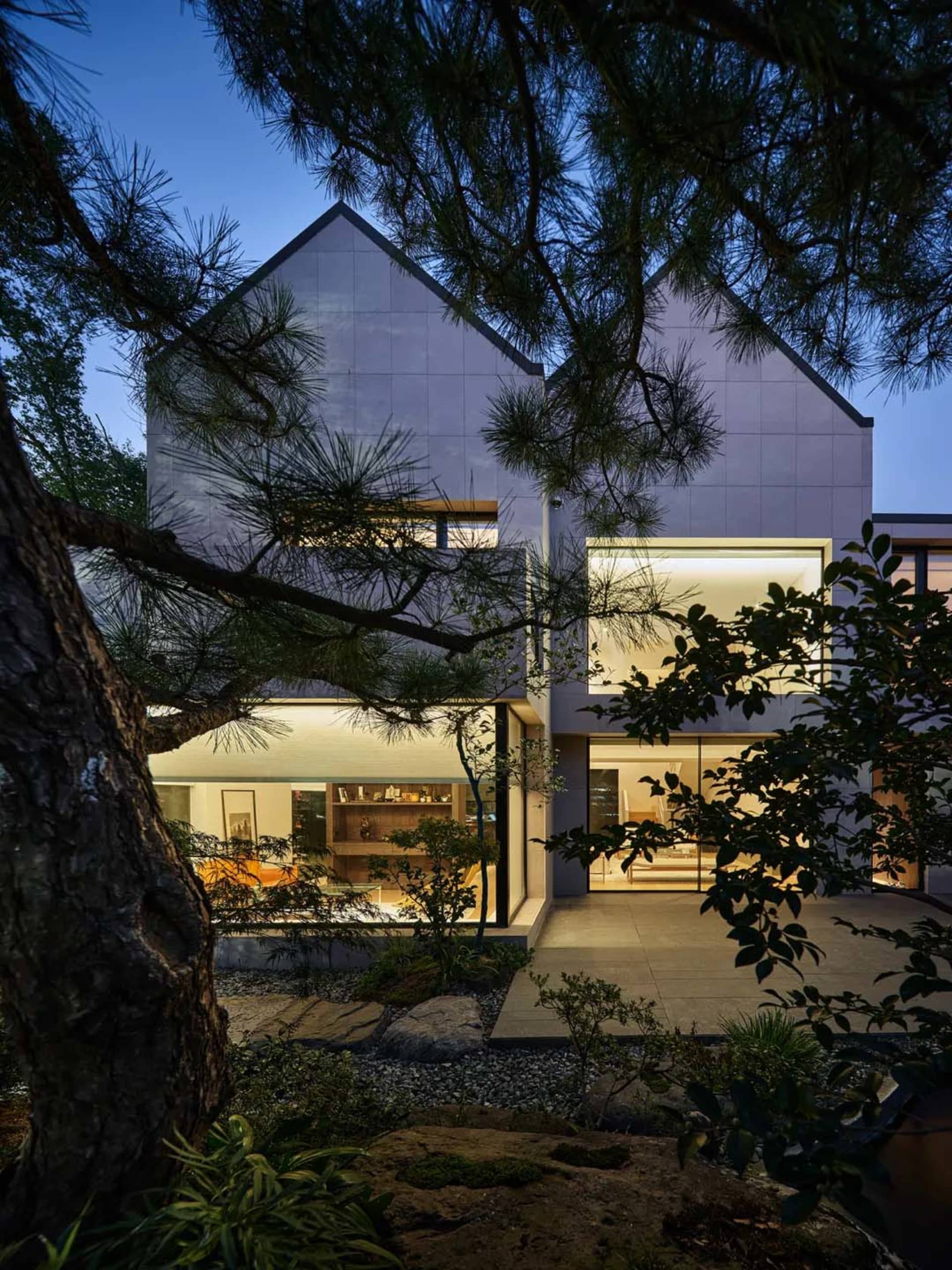 Modern house exterior with glass and concrete materials