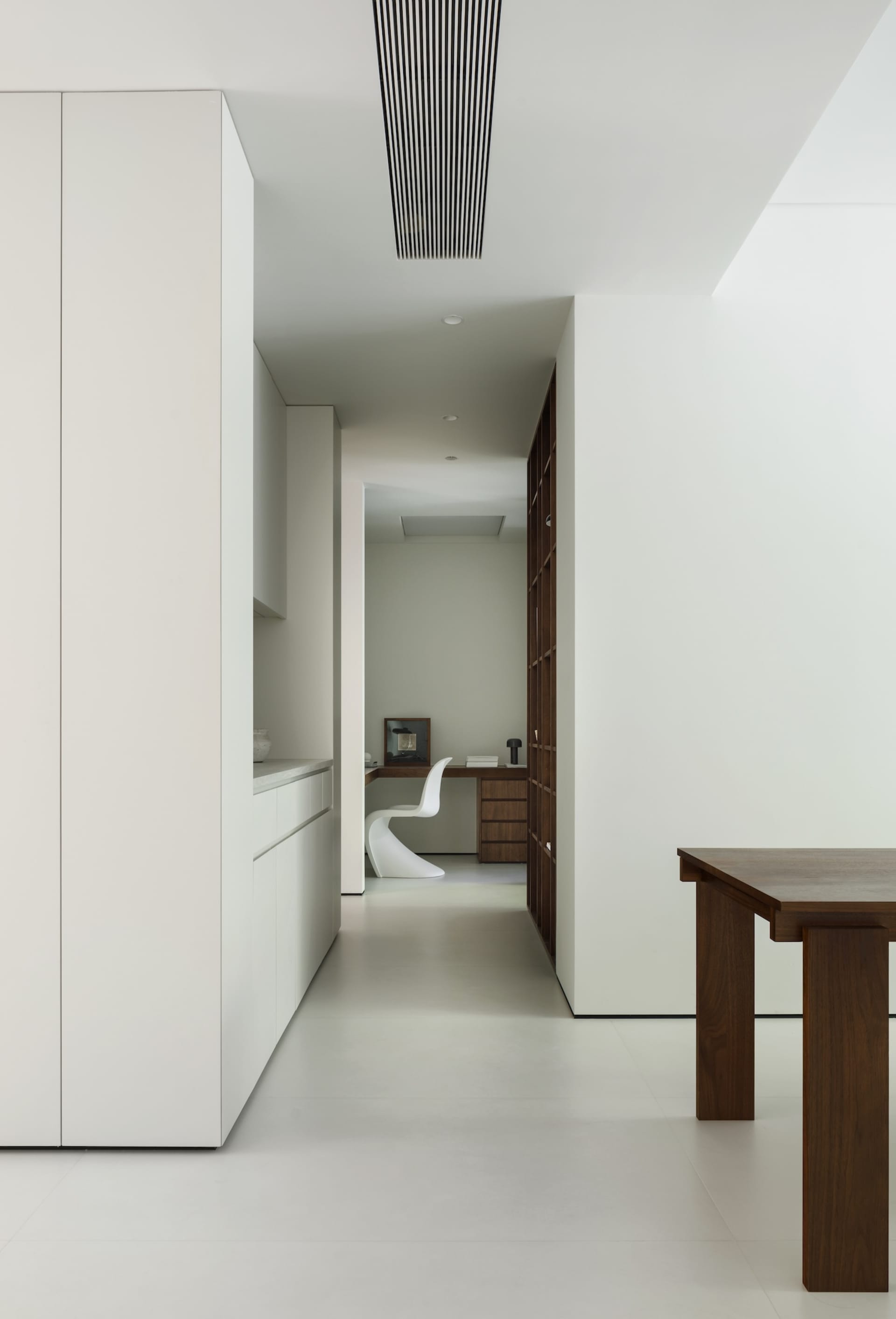 A modern interior with white walls and minimalist design.