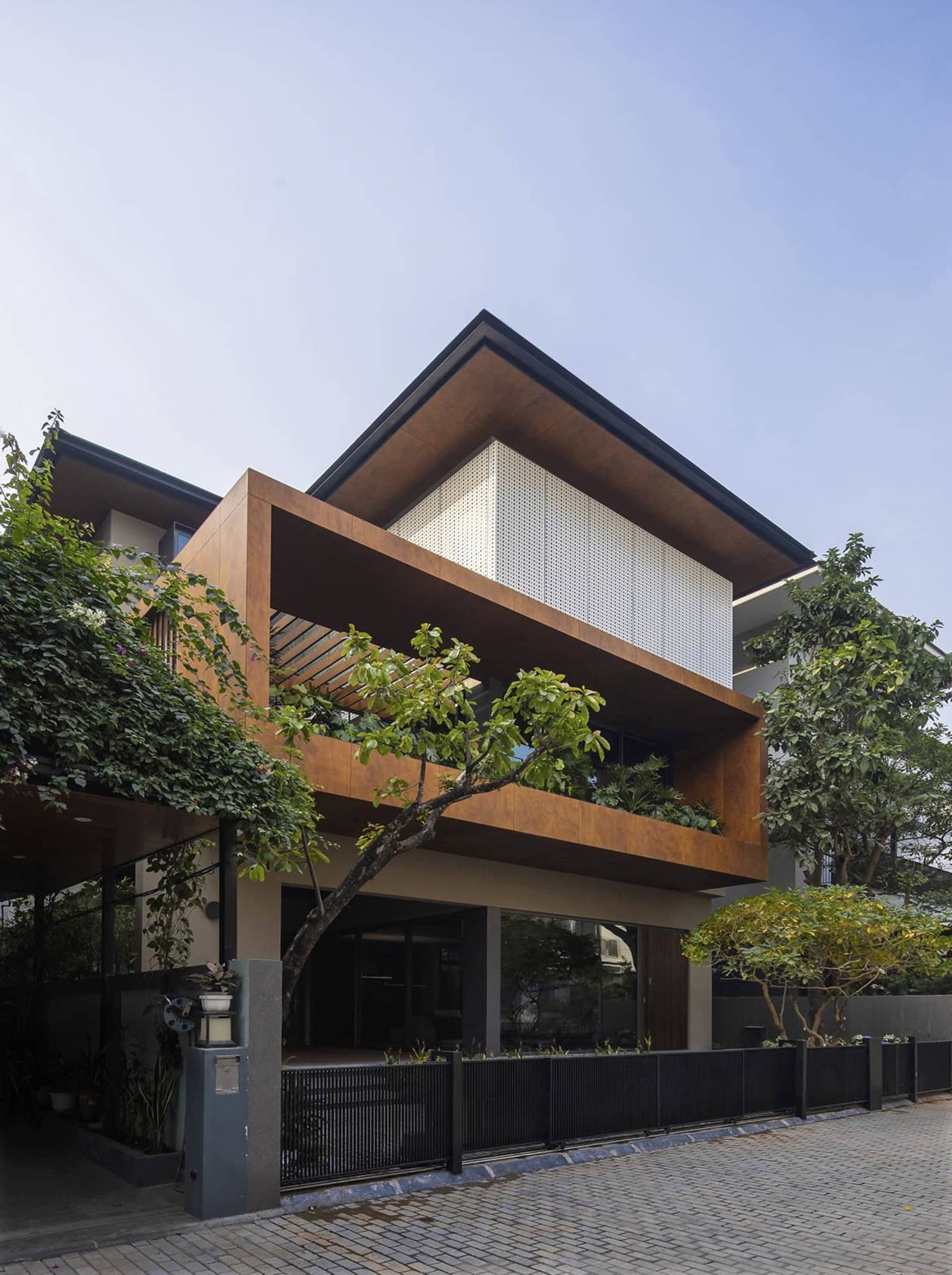 Modern building featuring a metal and concrete exterior.