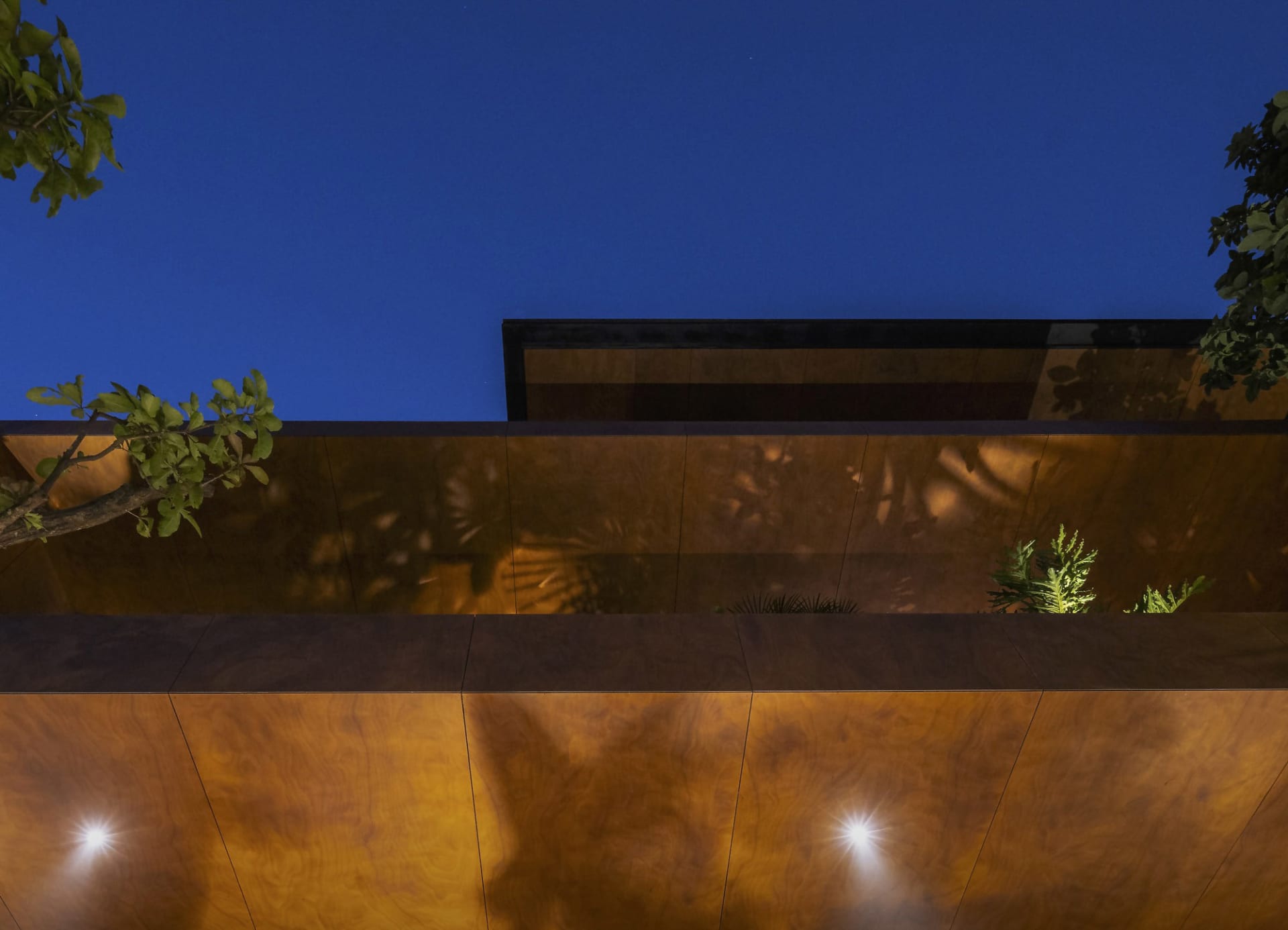 Modern metal wall exterior at night