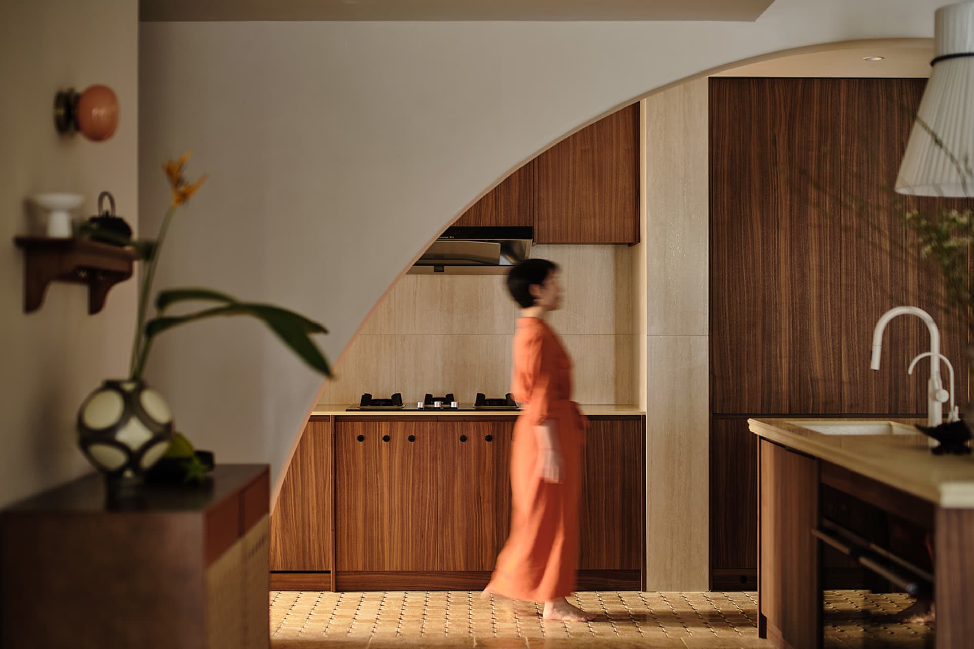 A modern residential interior with wood, stone, and glass features.