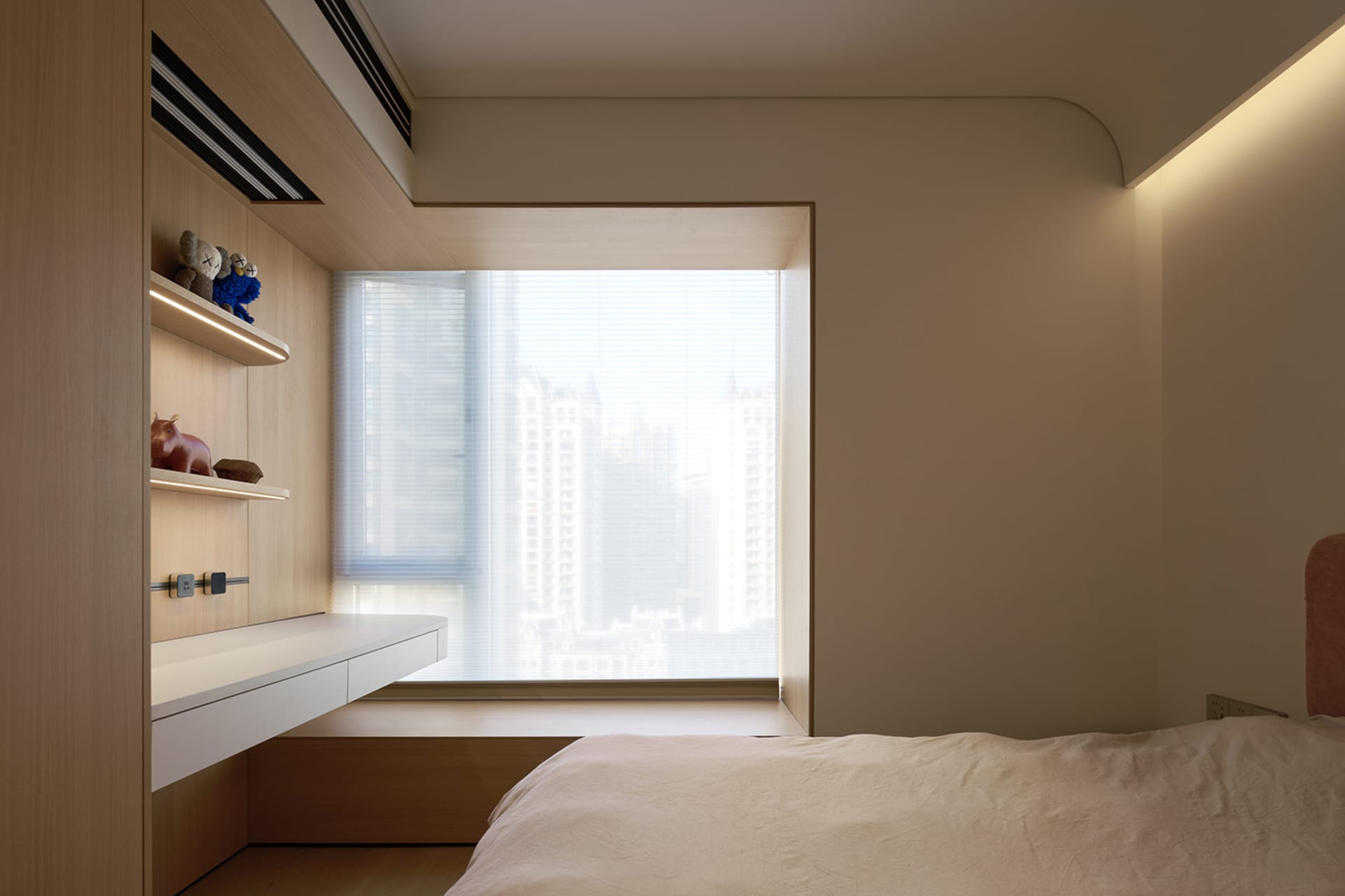 A serene, minimalist bedroom with a window overlooking a cityscape, featuring a wooden bed frame and sleek, white furnishings