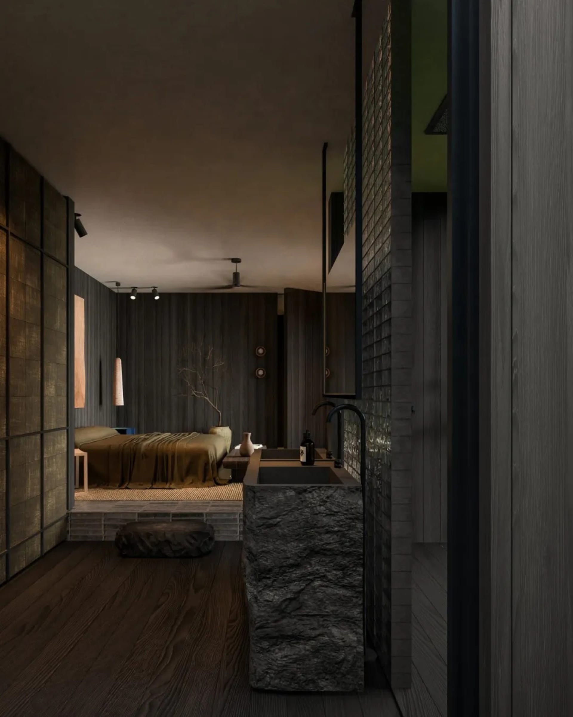 A minimalist bedroom featuring dark wooden paneling and concrete bathroom elements.